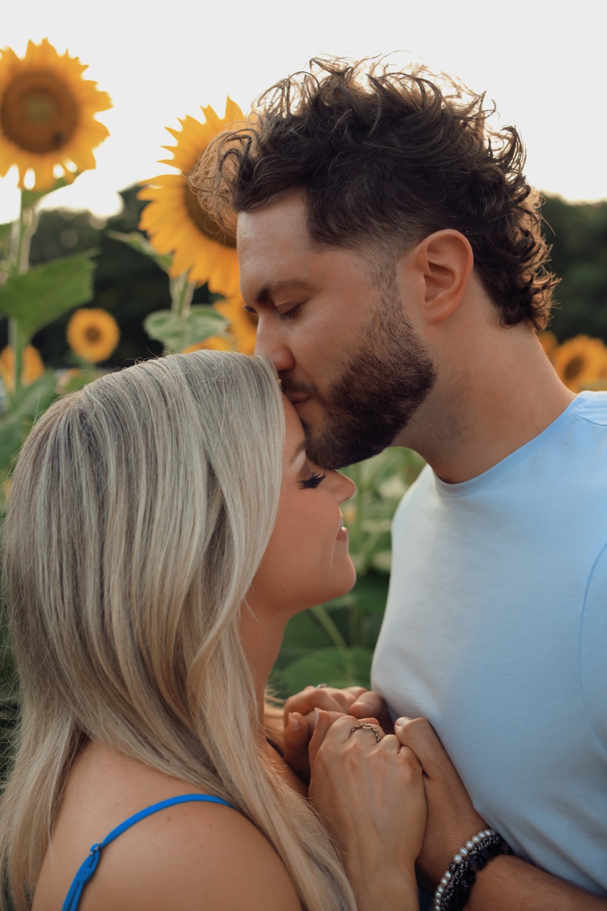 A kiss under the sunflowers.
